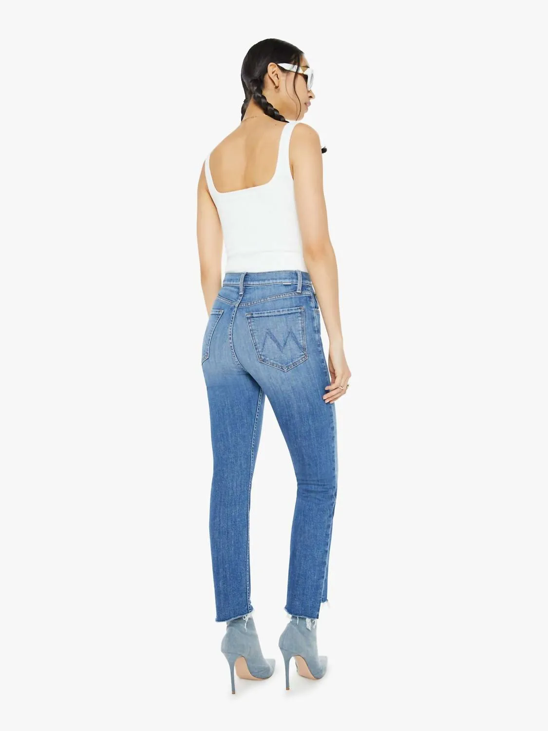 Hochgeschnittene Reiter-Jeans mit ausgefranstem Saum